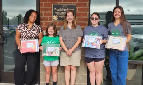 4-H campers put their hands to larger service